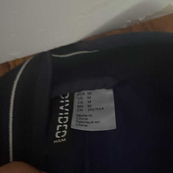 Navy blue and white letterman jacket, faux leather sleeves, soft torso. - Picture 4 of 5